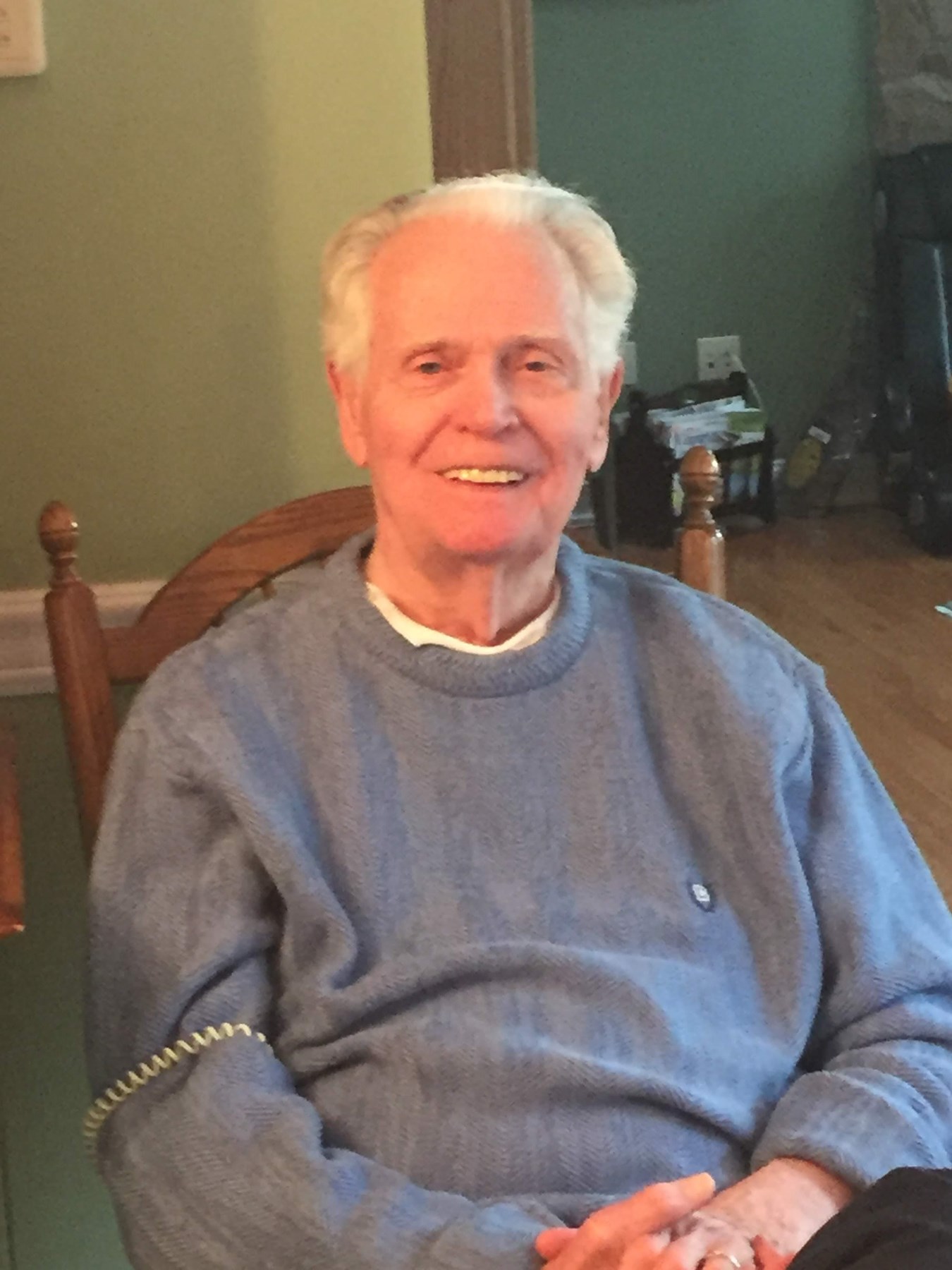 Obituary of John J. Reynolds