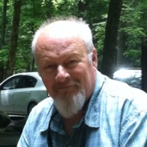 Obituary of James E May