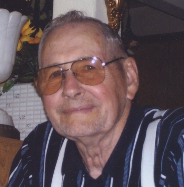 Obituary of Gene L. Houck