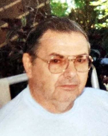 Obituary of John T Woods