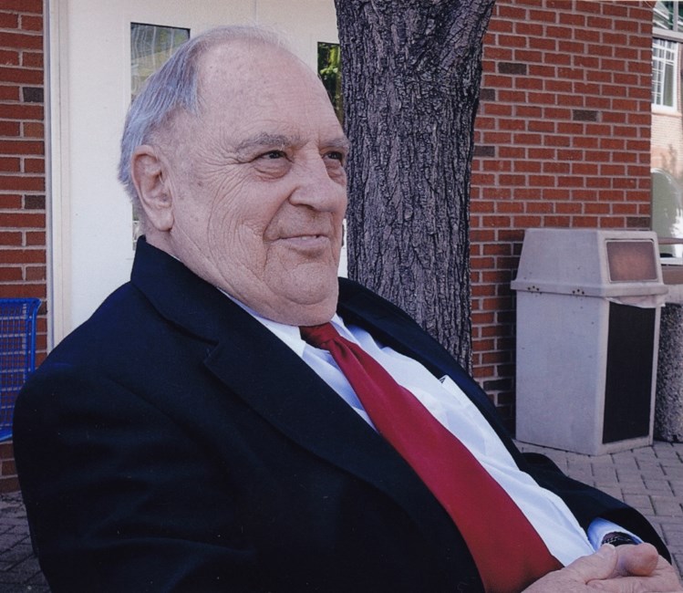 Obituary of Raymond H. Davison