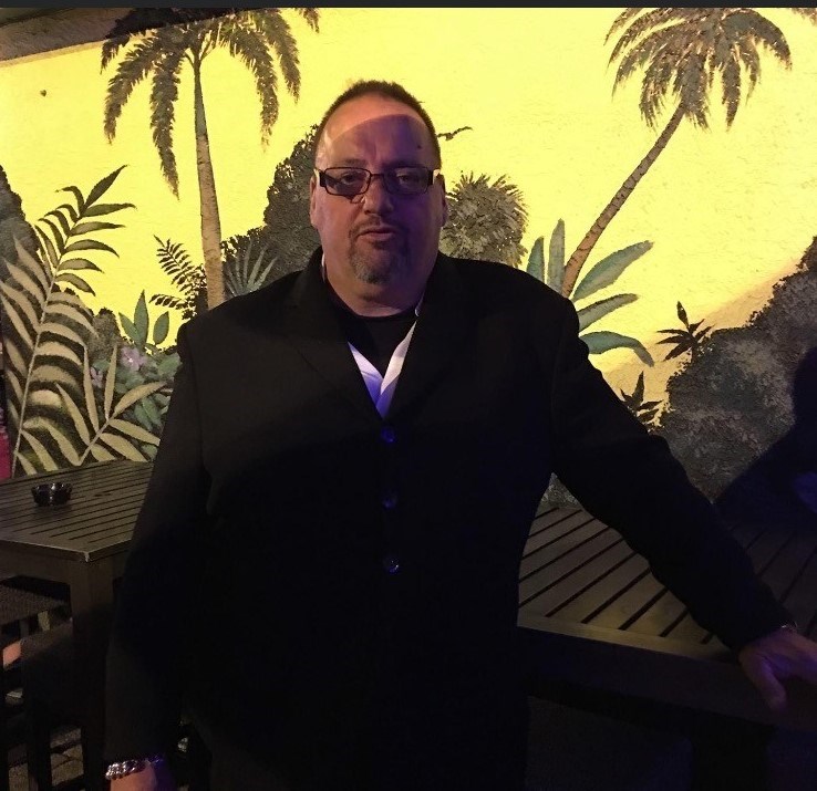 Obituary of Gregory Russ