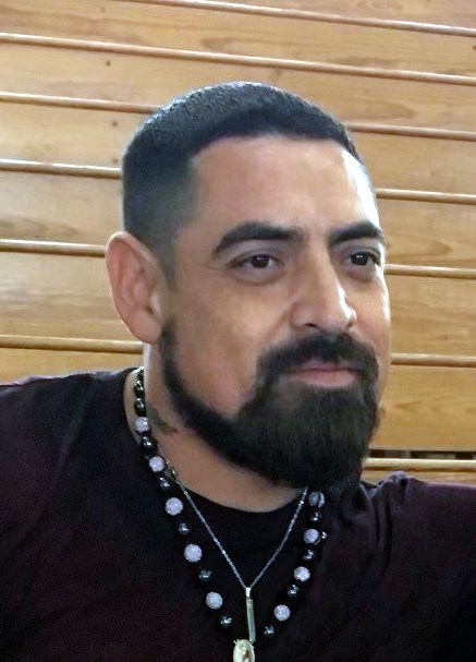 Obituary of Gino Flores