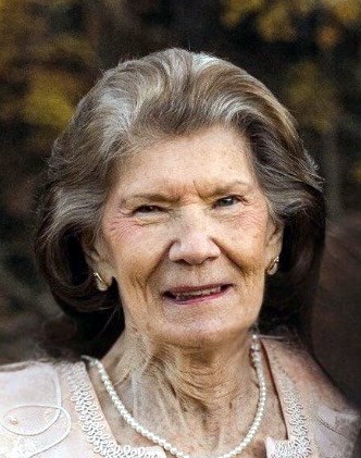 Obituary of Carolyn Wilkerson Woolley