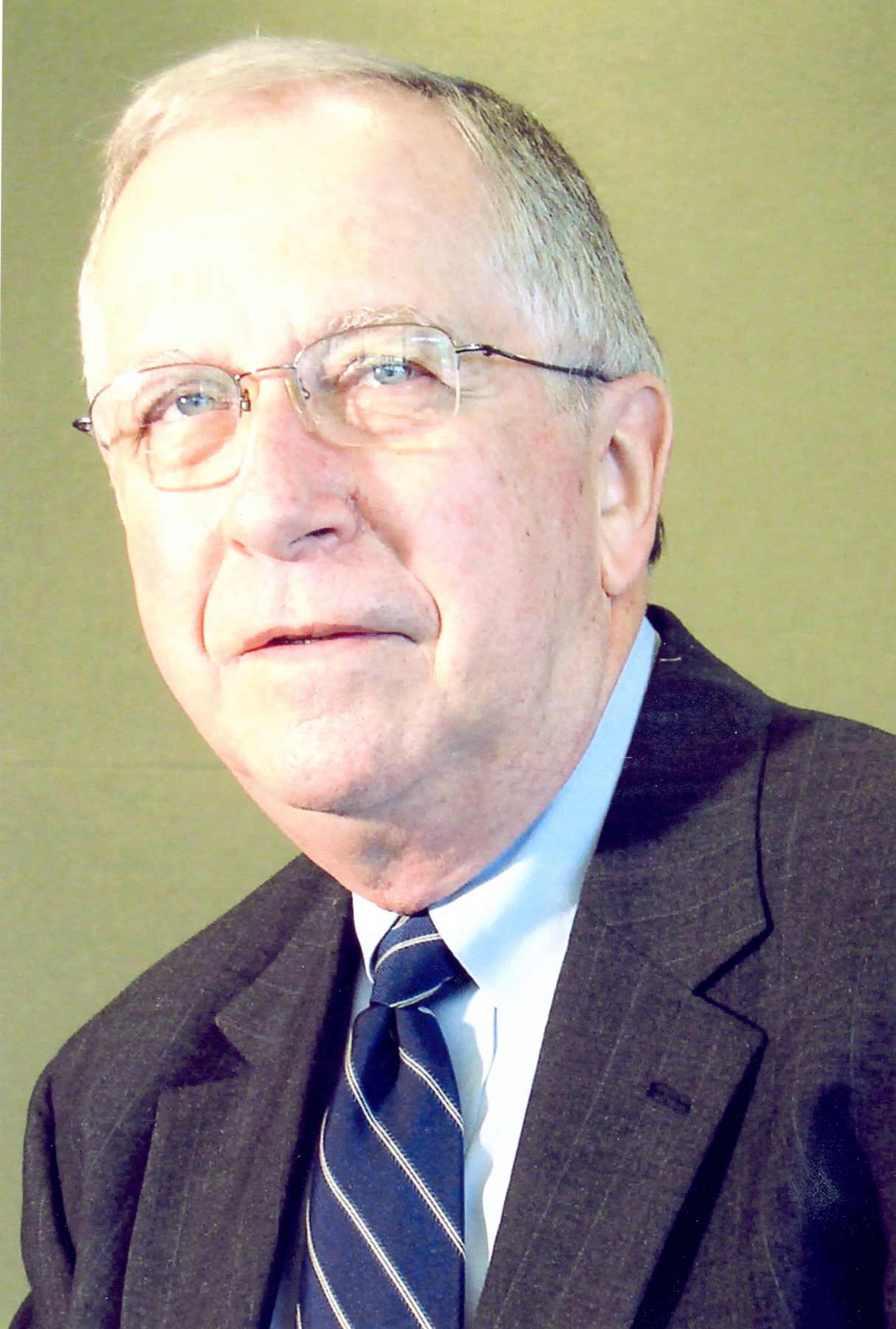 Obituary of Dr. Joseph E. Champagne