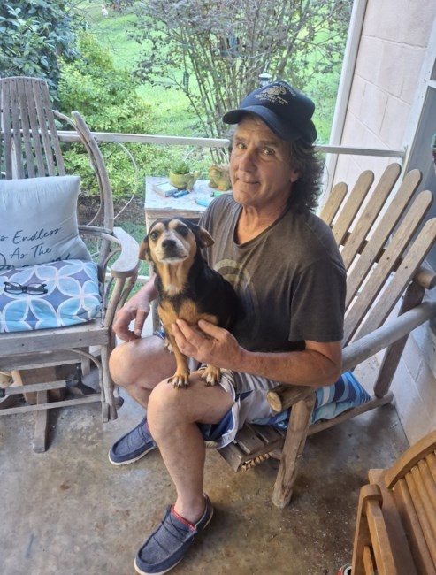Obituary of John Douglas Holley