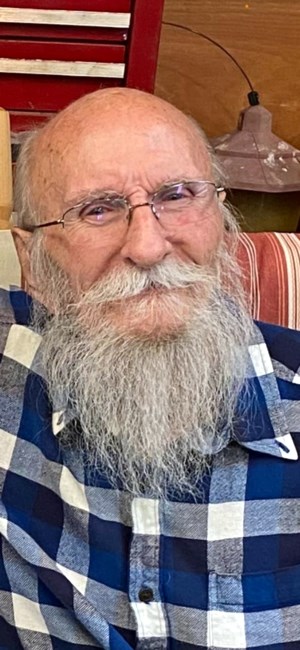 Obituary of Ernest C Rose