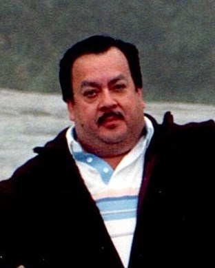 Obituary of Carlos C. Garza