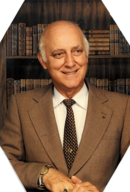 Obituario de Dr. Leslie M. Reid