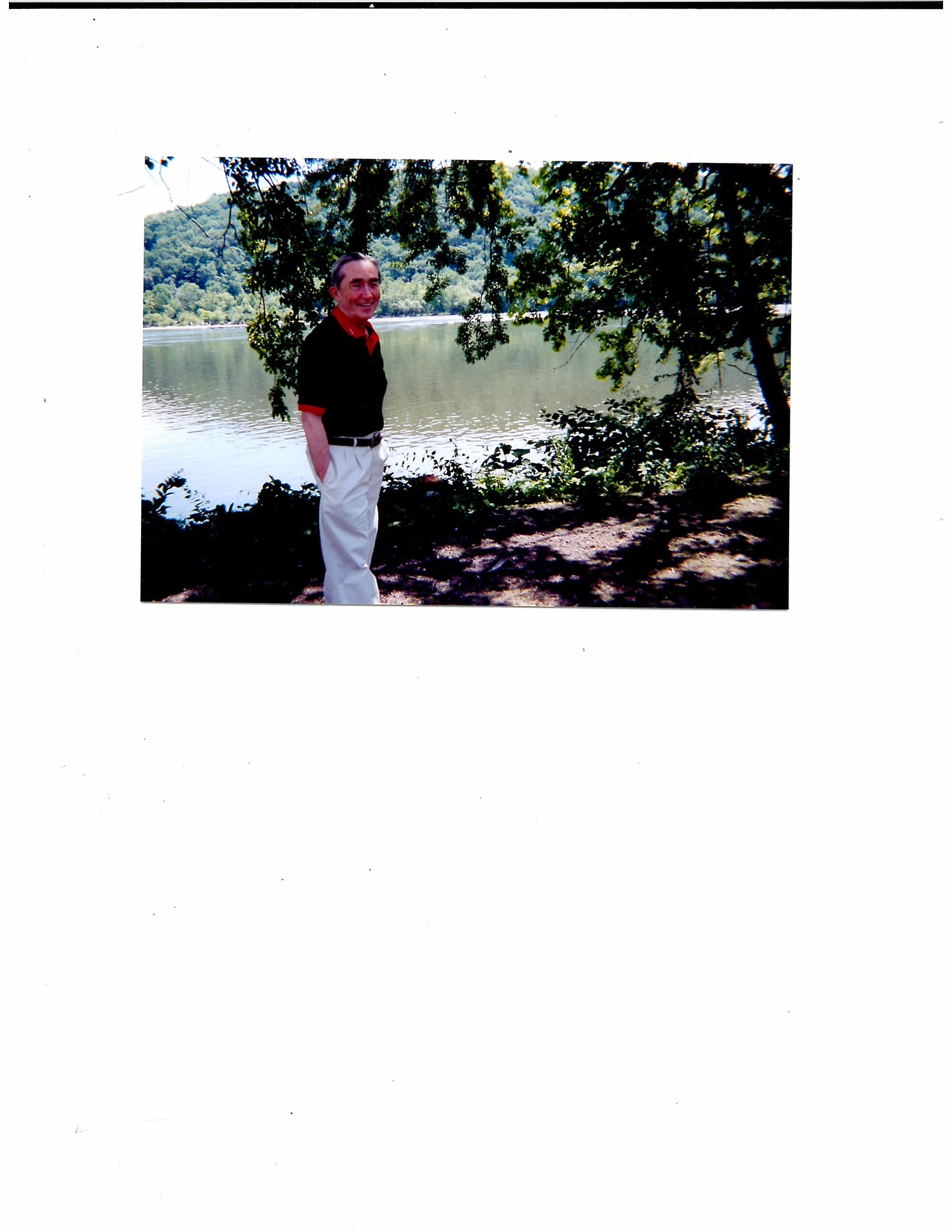 Avis de décès de John E. McCormack