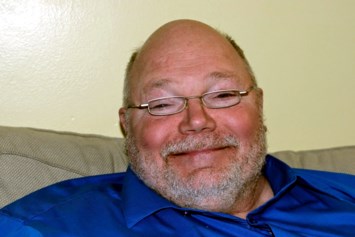 Obituary of Daniel R. Rhodes