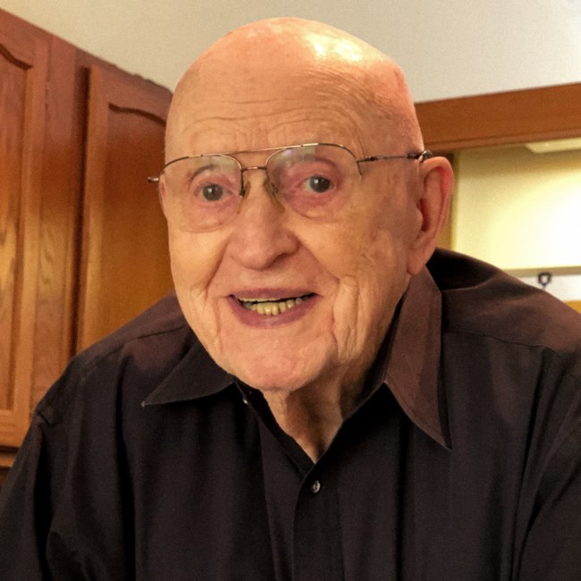 Obituary of Emerson W Ebert