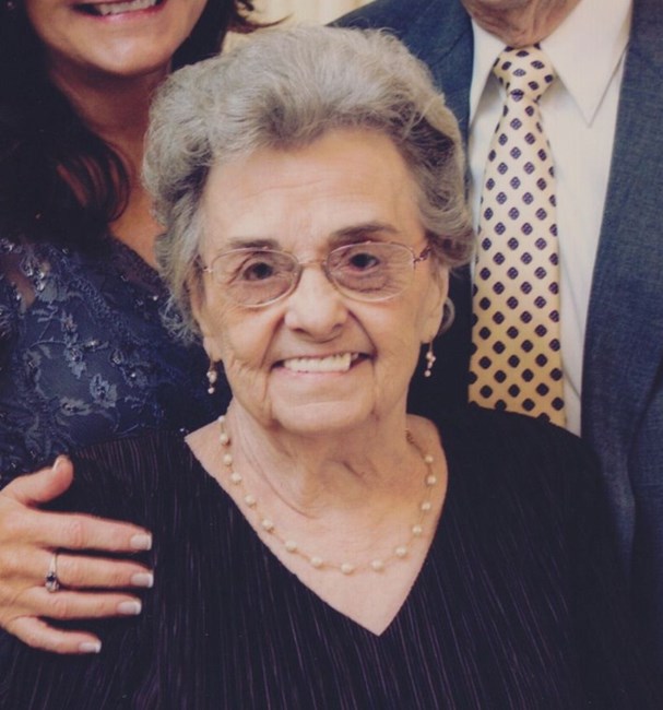 Obituary of Marie Wolf Sims