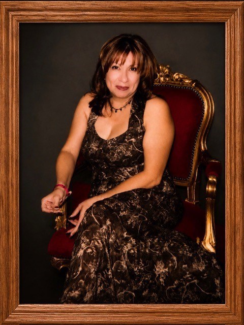 Obituary of Maria Lourdes Carmen Herreman