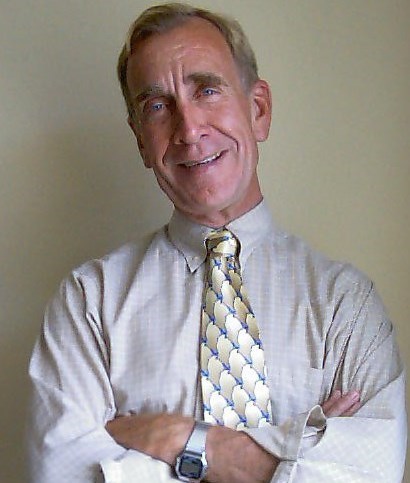 Obituary of Louis Rowell Huesmann