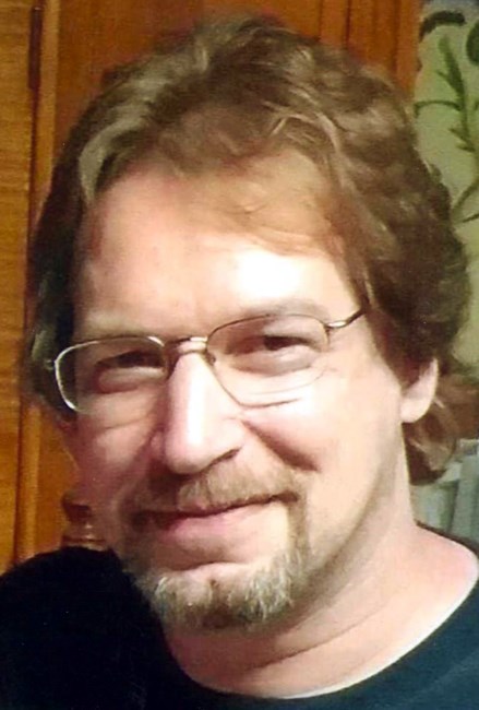 Obituary of John P. Squires