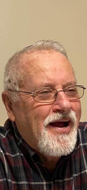 Obituary of Henri Caron