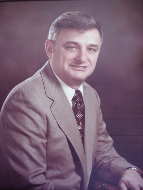 Obituary of Robert E Carlton