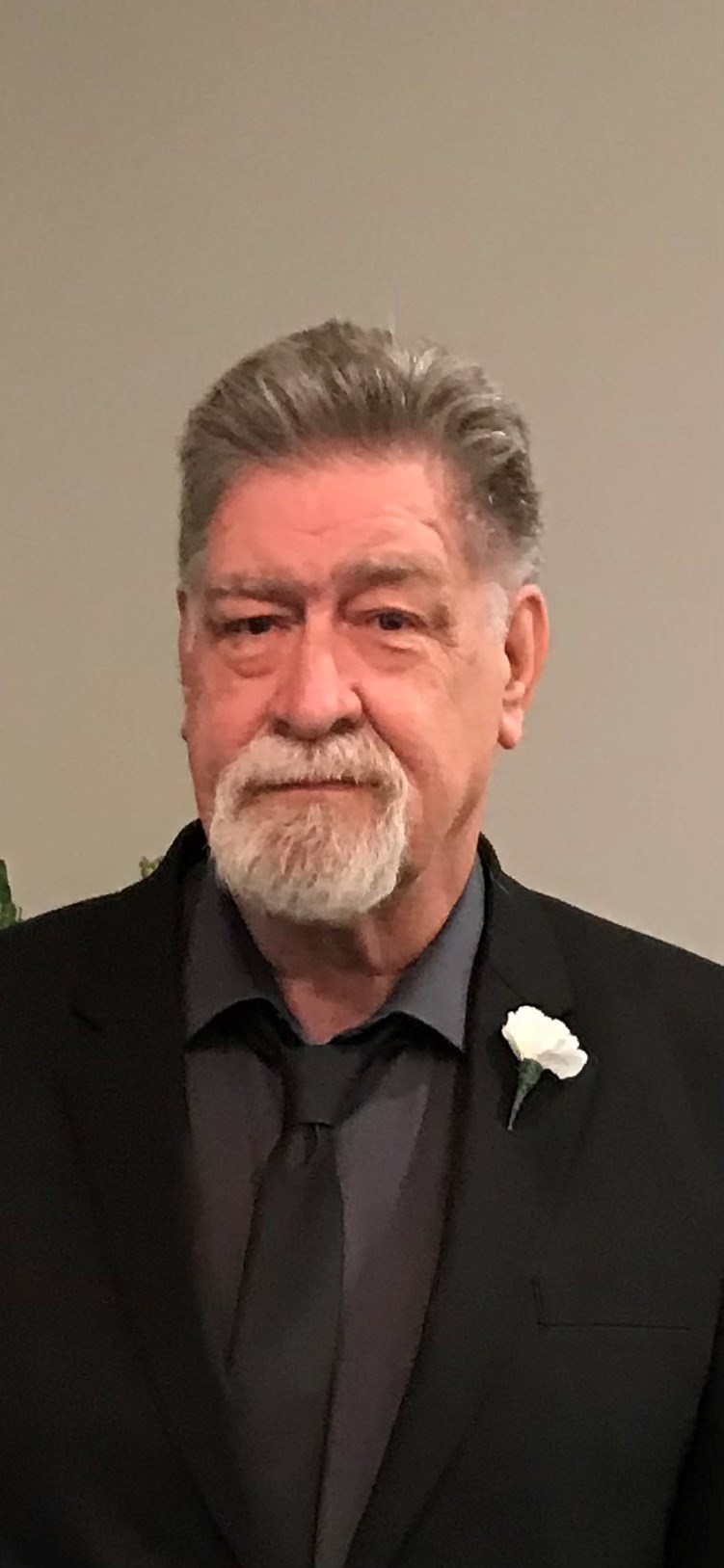 Obituary of Roger W Grisham