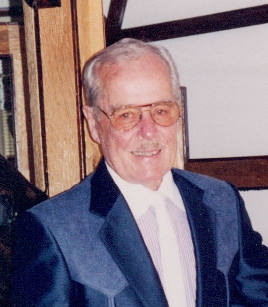Obituary of Reuben E Krigbaum