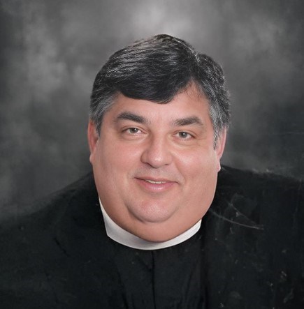 Obituary of Canon Ernest W Saik