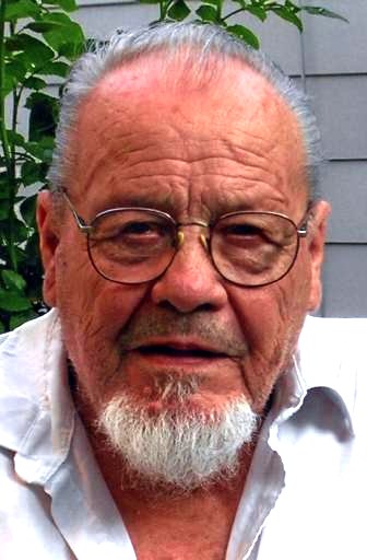 Obituario de Claude R. Dube