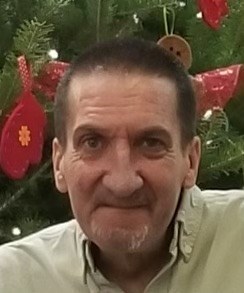 Obituary of Denis L Gilbert