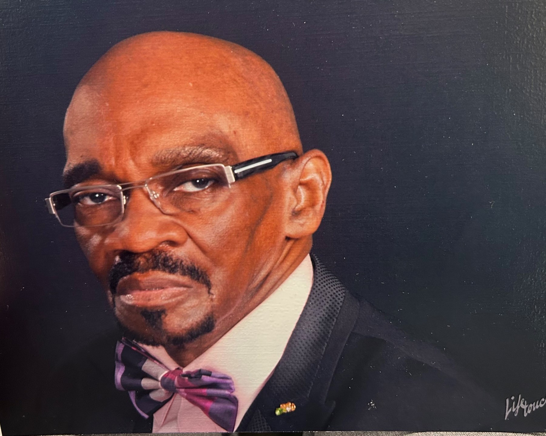 Obituary of Pastor James E. Harris