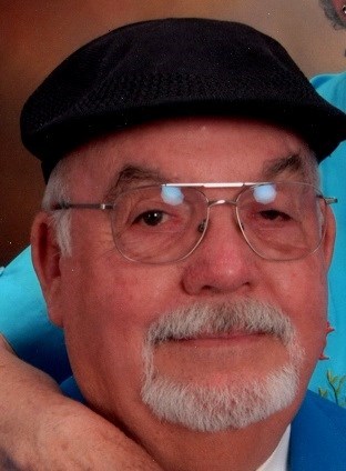 Obituary of John W. McCombs