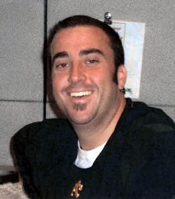 Obituary of Justin John Doucet