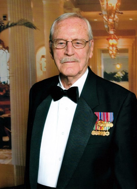 Obituary of John A. Malcolm