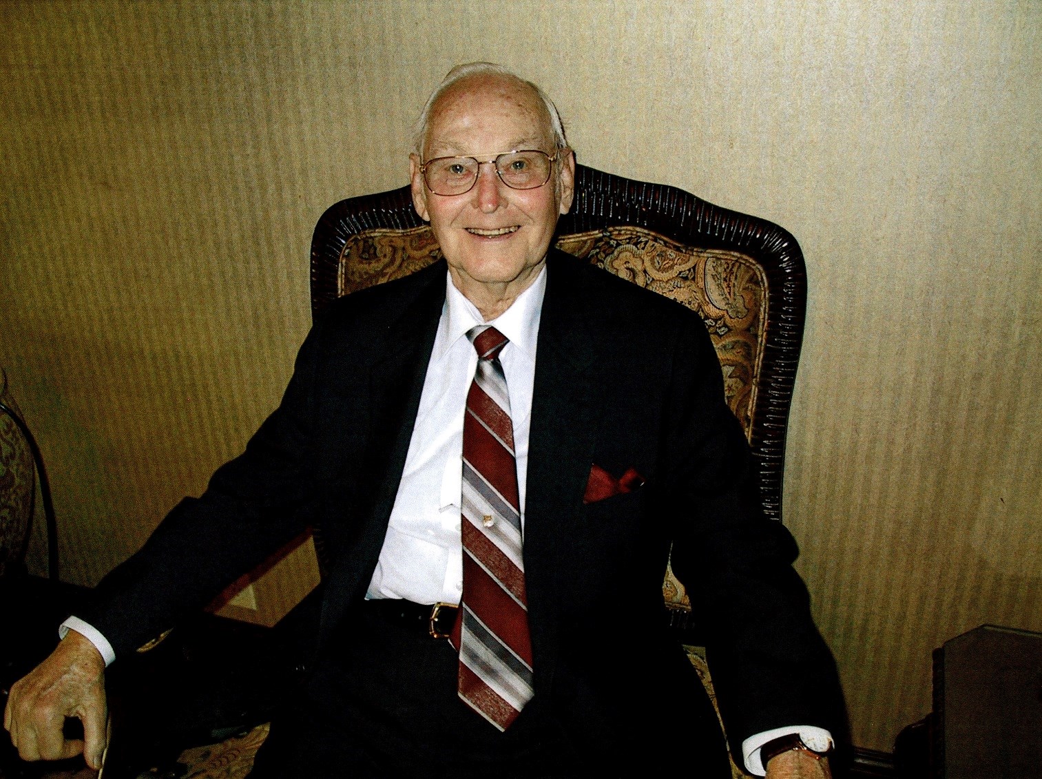 Obituary of James Douglas Holmes