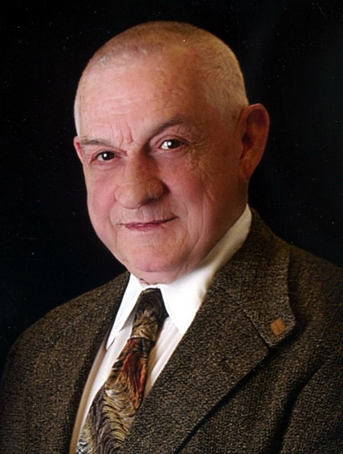 Obituario de Charles E. Lane