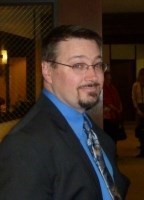 Obituary of Michael E Lomax