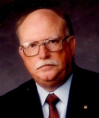 Obituary of James "Tom" Thomas Garrett