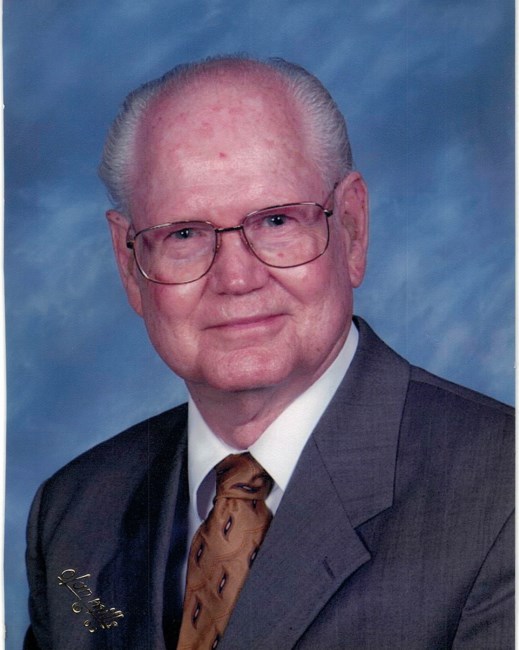 Obituary of Robert E White