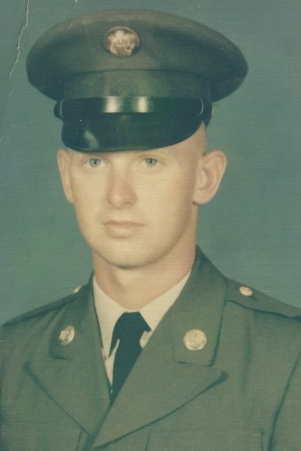 Obituary of John E. Rollins