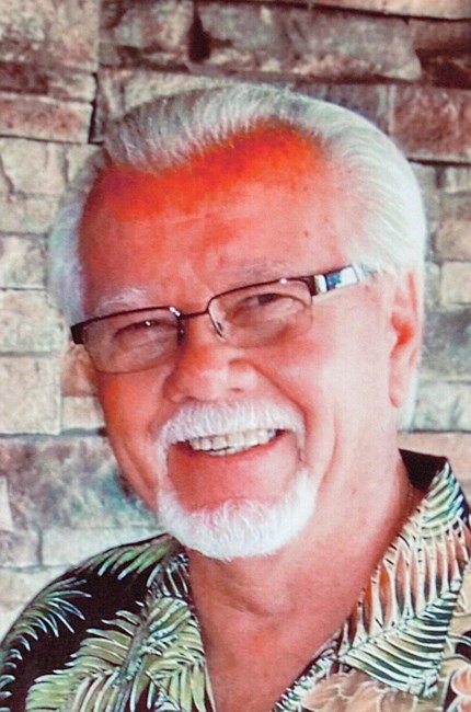 Obituary of John Stanley McQuitty