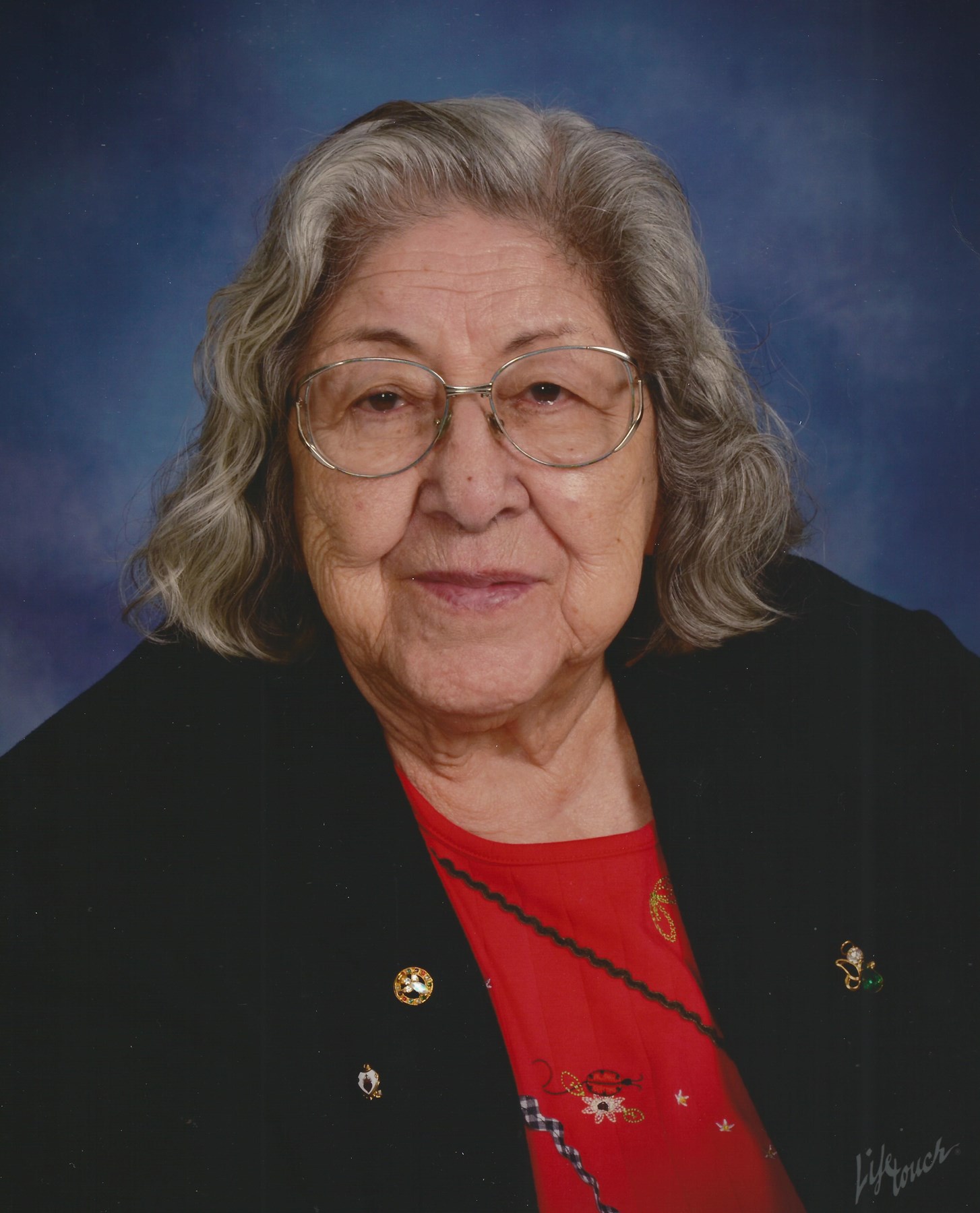 Obituary of Louise M. Bustos