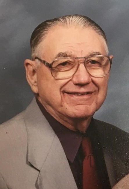 Obituario de Aubrey James Holmes