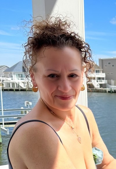 Obituary of Luz E. Santos