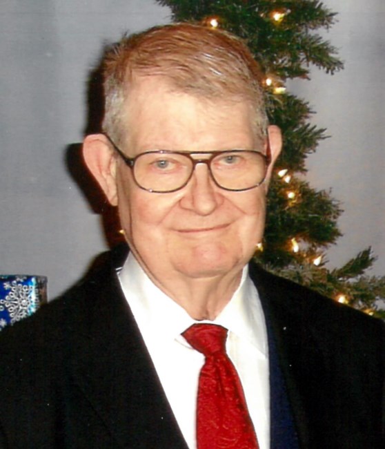 Obituario de Charles E. Comfort