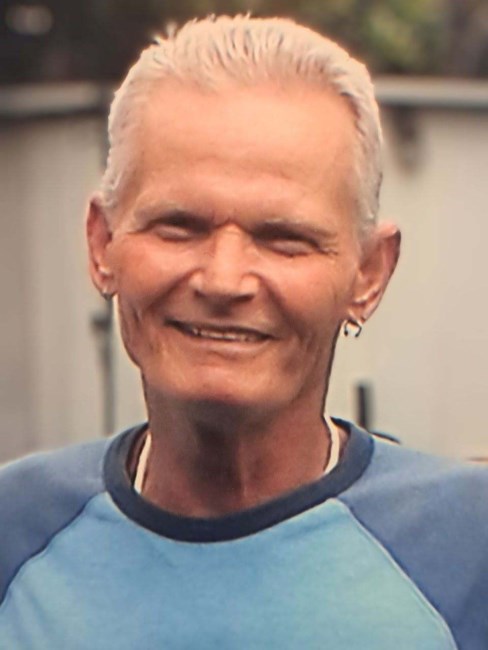 Obituary of John R Ezelle Jr.