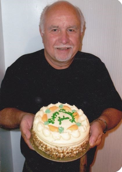 Obituary of John T Rakow