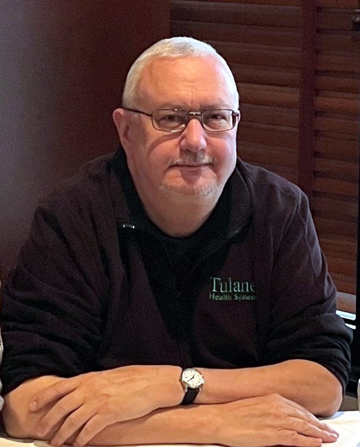 Avis de décès de Dr. Mack R. Holdiness MD, PhD